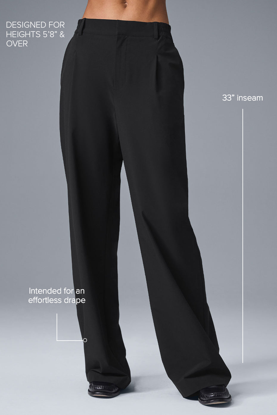 Close-up of the tailored details on Elevate Black High-Waist Trousers.