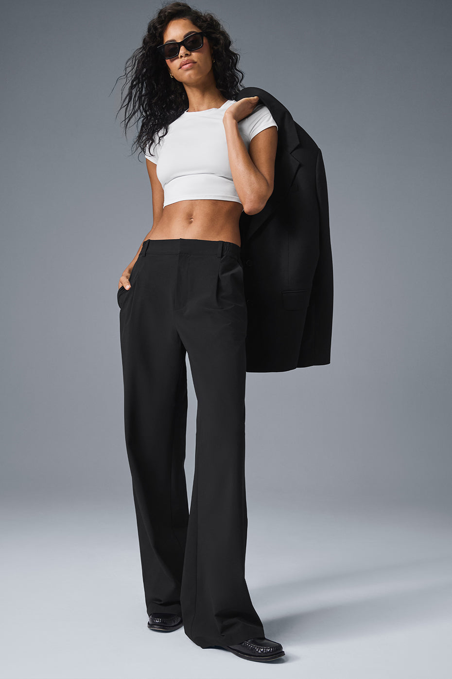 Side view of Elevate High-Waist Trousers showcased in a relaxed fit.