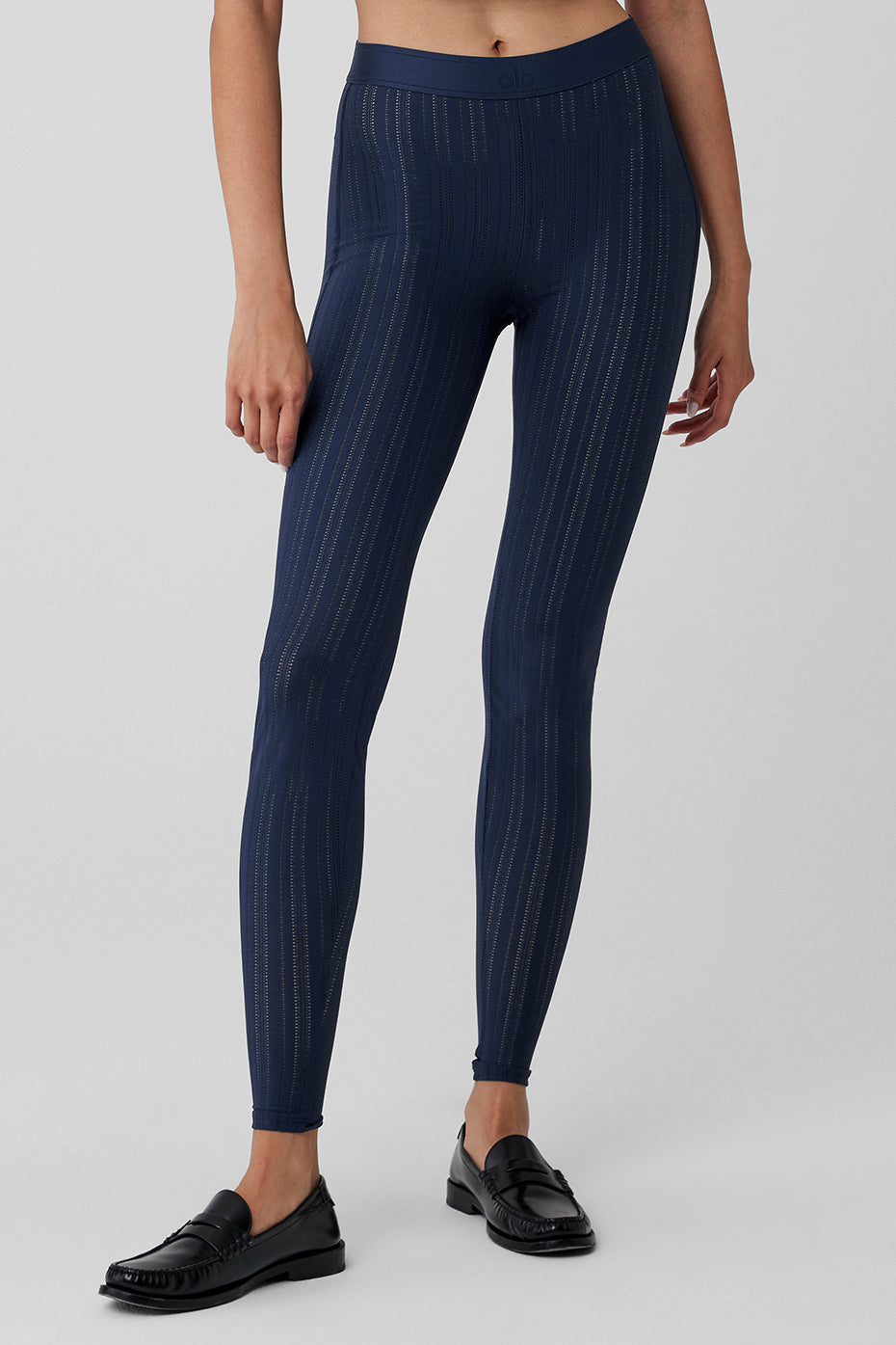 Front angle of Euphoria high-waist leggings in navy, styled with button-down shirt.