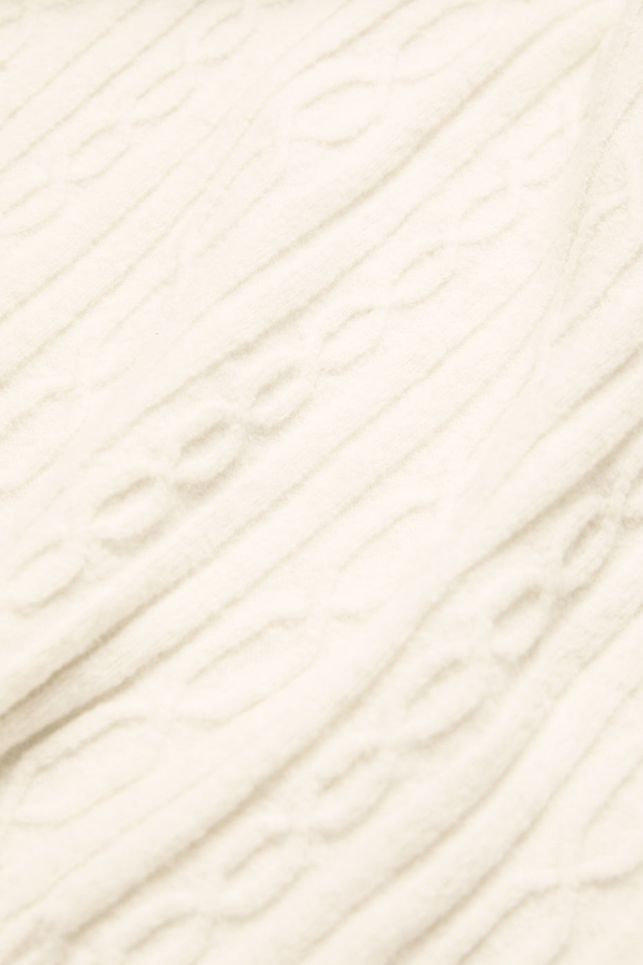 Relaxed fit ivory lounge pants with pockets, perfect for lounging.