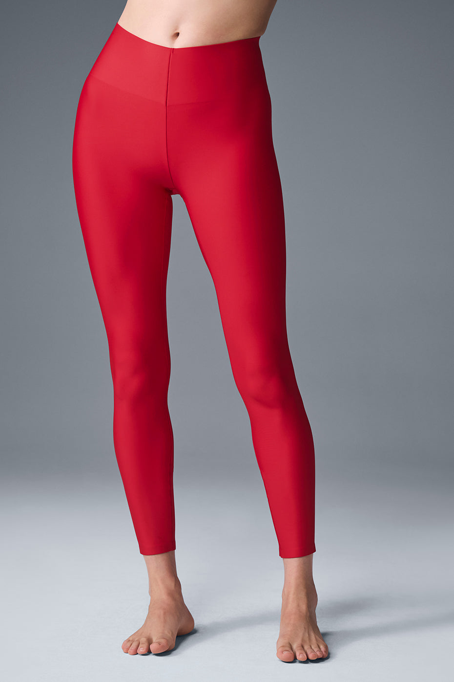 Front view of Bold Red high-waist Airlift leggings during a workout