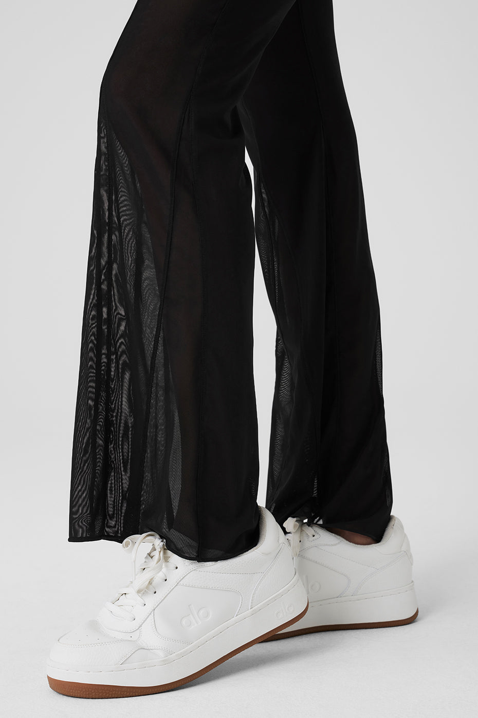 Close-up of mesh fabric texture on high-waist festival pants
