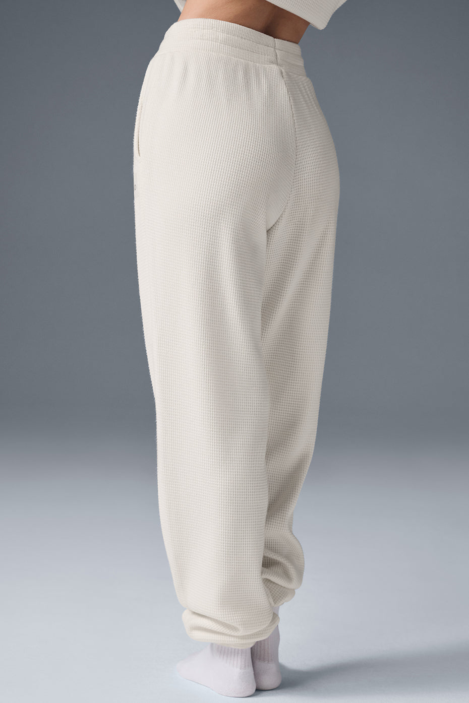 Close-up of waffle knit fabric texture and high-rise waistband