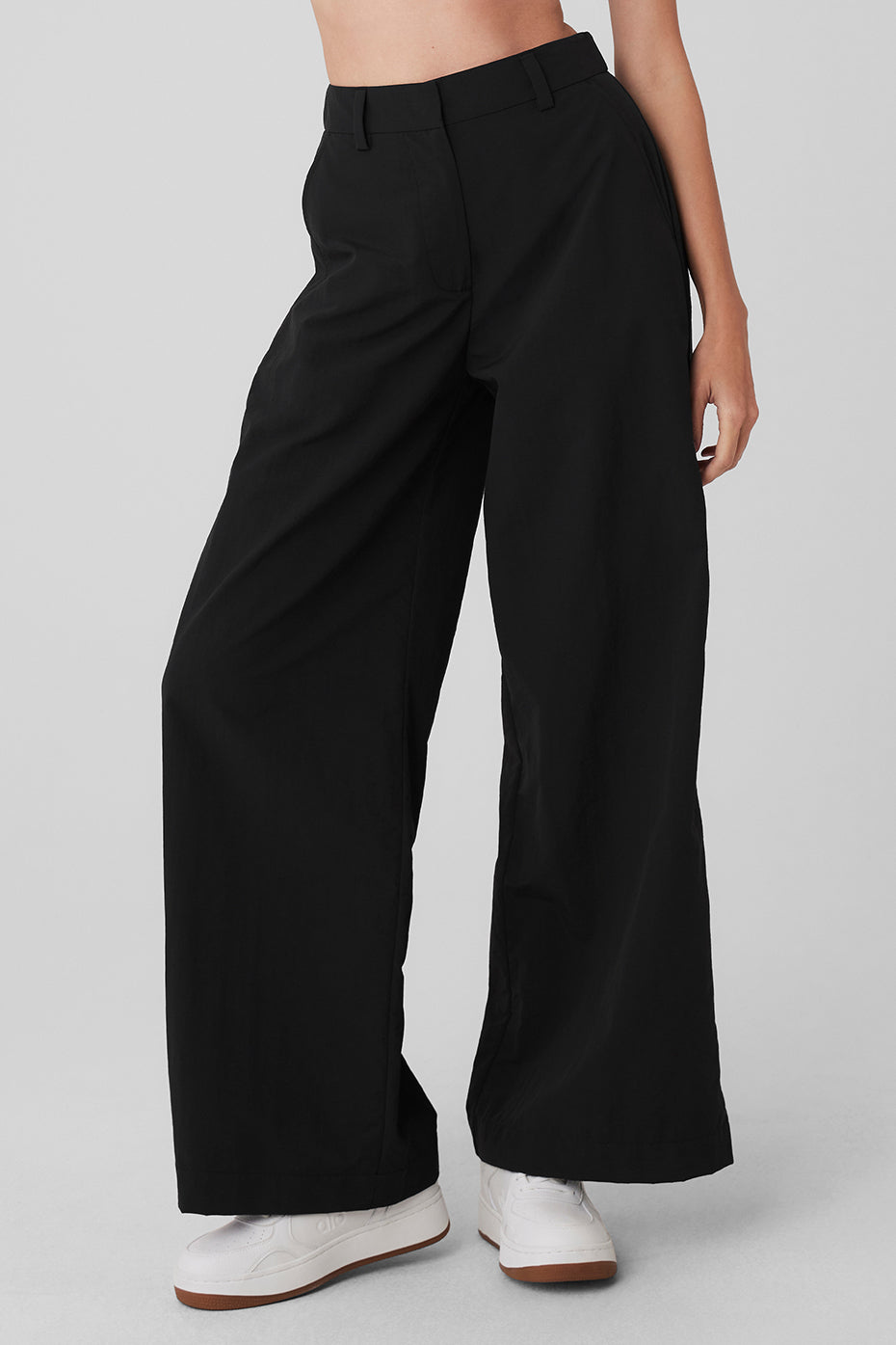 Front view of black cargo pants mens styled with a casual tee.