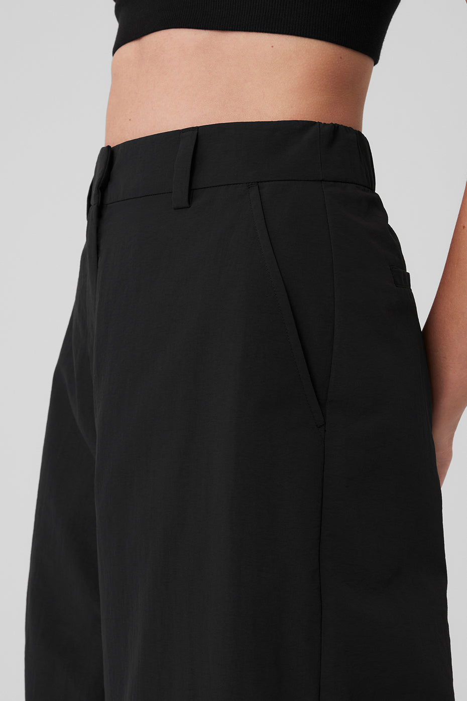 Front view of black cargo pants mens styled with a casual tee.