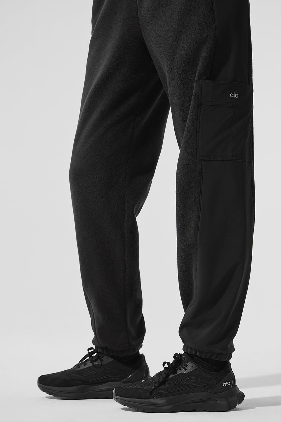 Front view of cozy fleece jogger pants for women in black.