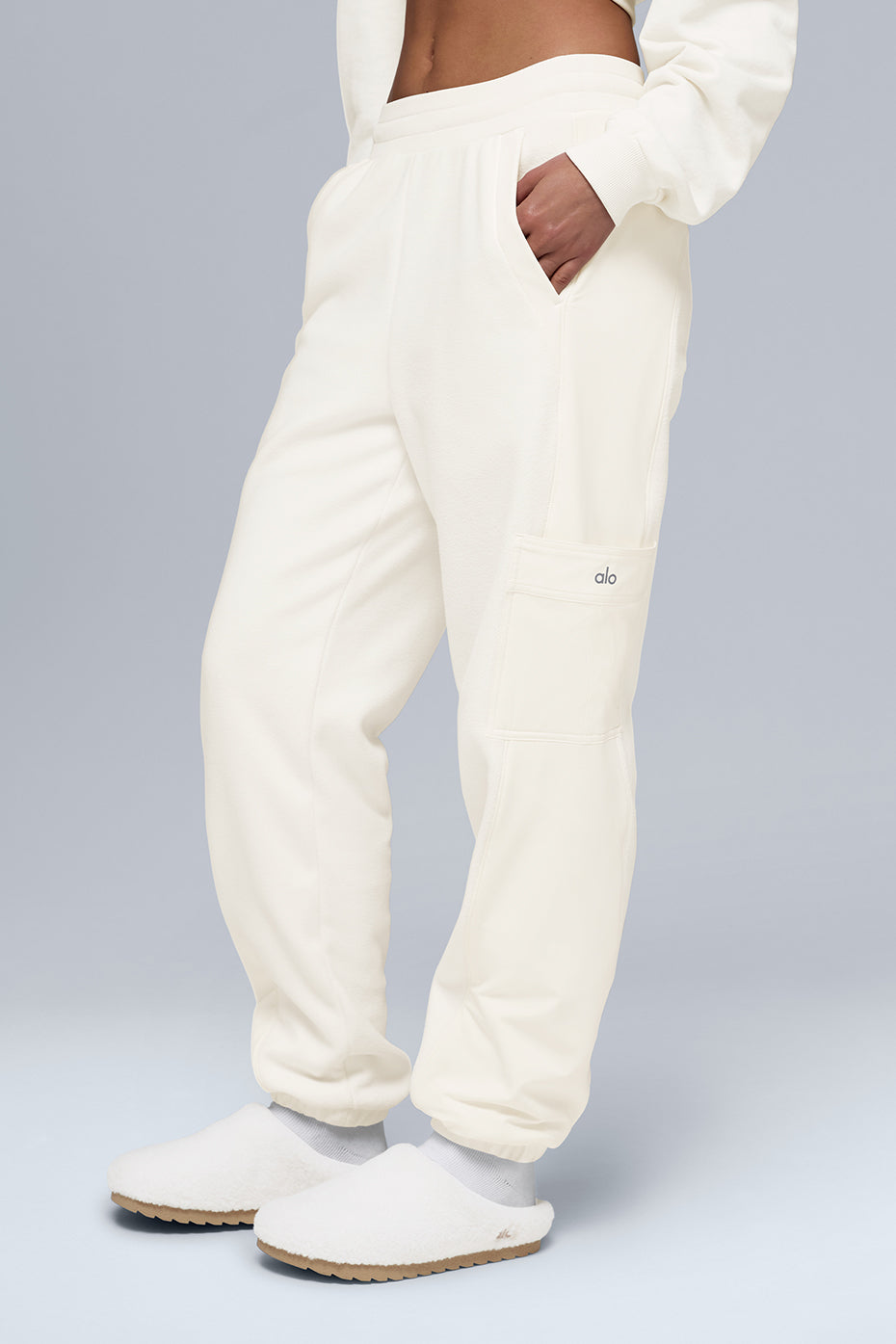 Close-up of the stretchy waistband and cuffed hems on the joggers.