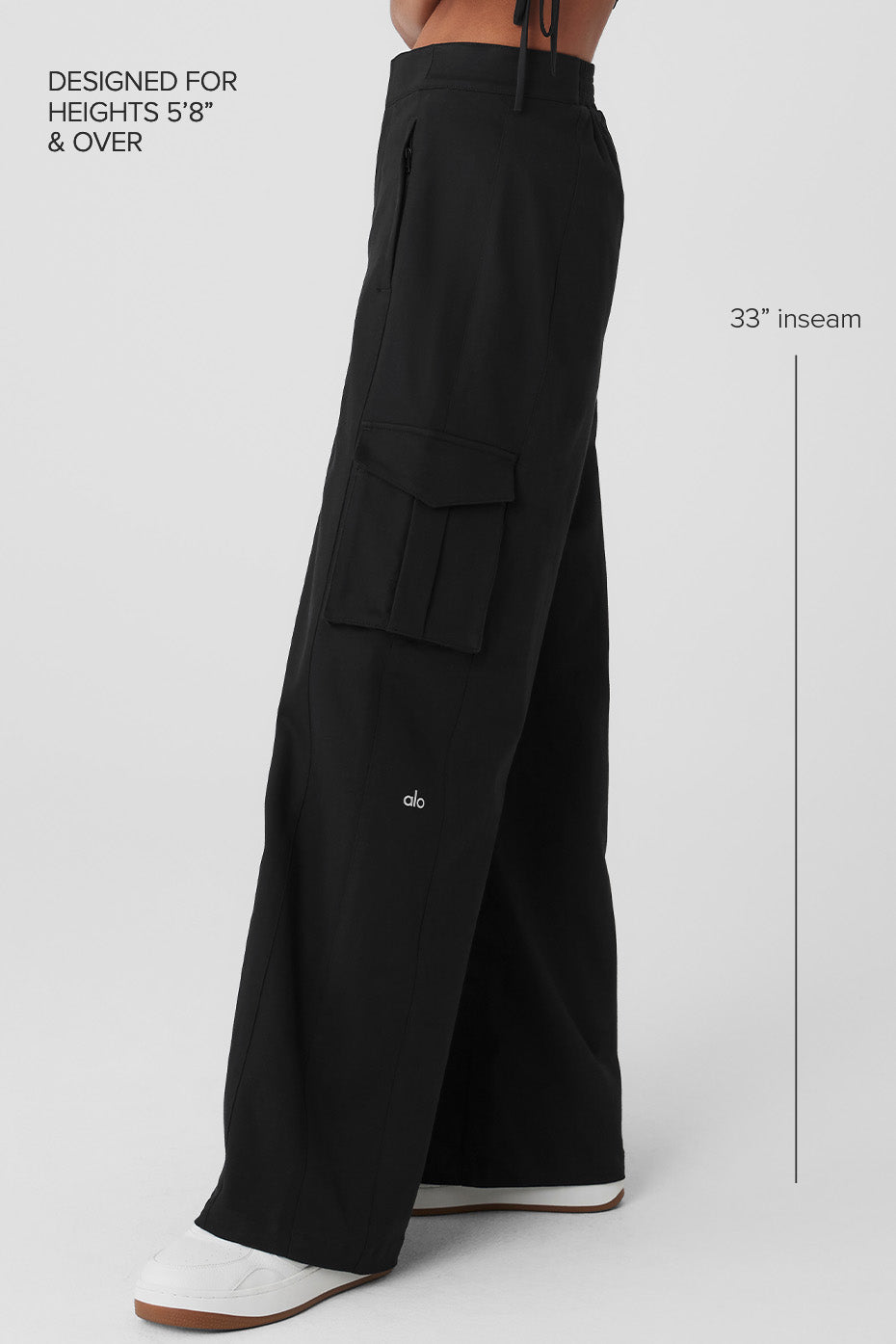 Side angle of womens cargo pants with wide legs, ideal for everyday wear.