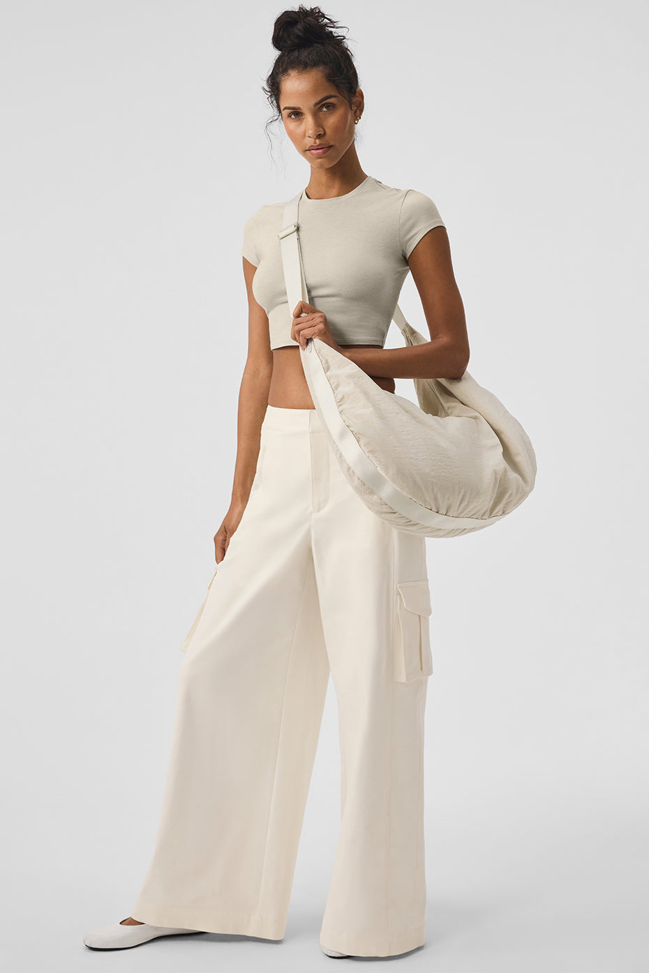 Side view of womens cargo pants with wide legs, perfect for casual outings.