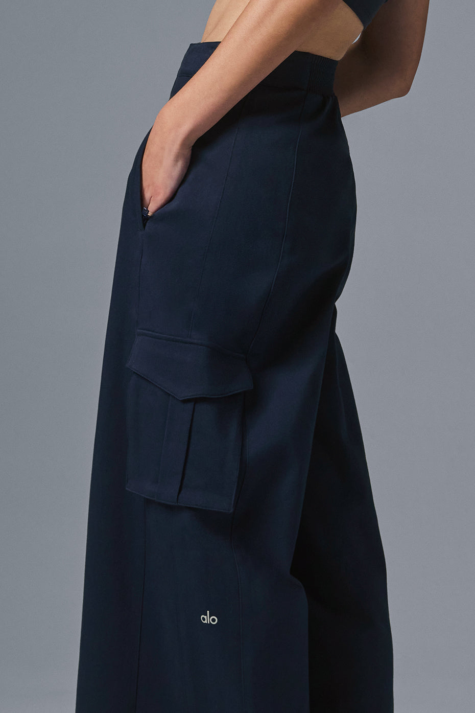 Back view of navy wide leg trousers, showcasing the high waist and stretchy back.