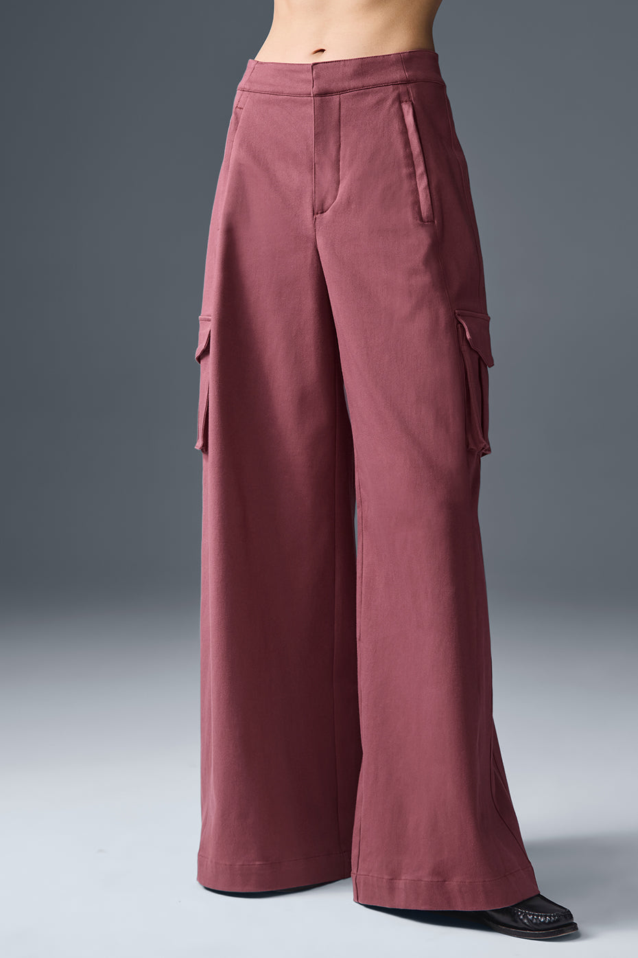 Full front view of trousers womens wide leg style in burgundy with cargo pocket detailing