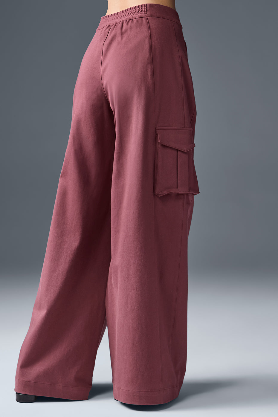 Side profile showcasing wide leg trousers men alternative styling with bold silhouette