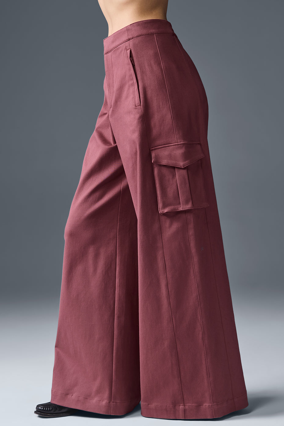 High waist trousers back view highlighting stretch-fit waistband and relaxed drape