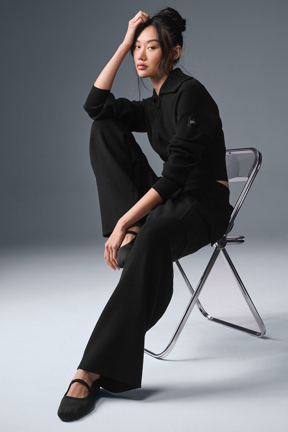 Casual outfit featuring black cargo pants and a trendy puffer jacket.