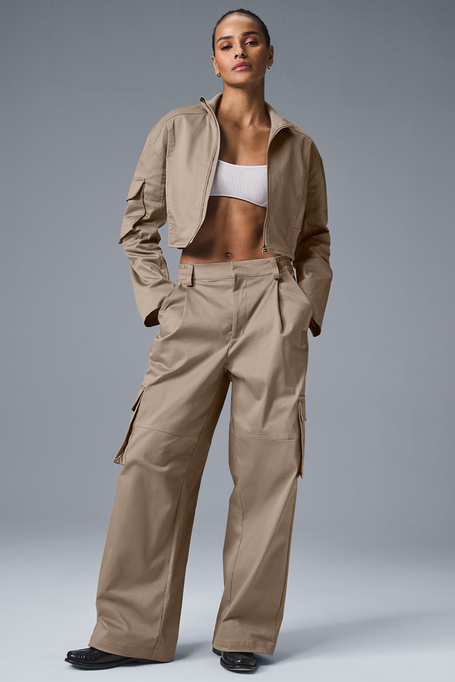Styled shot of women wearing statement cargo trousers for night out