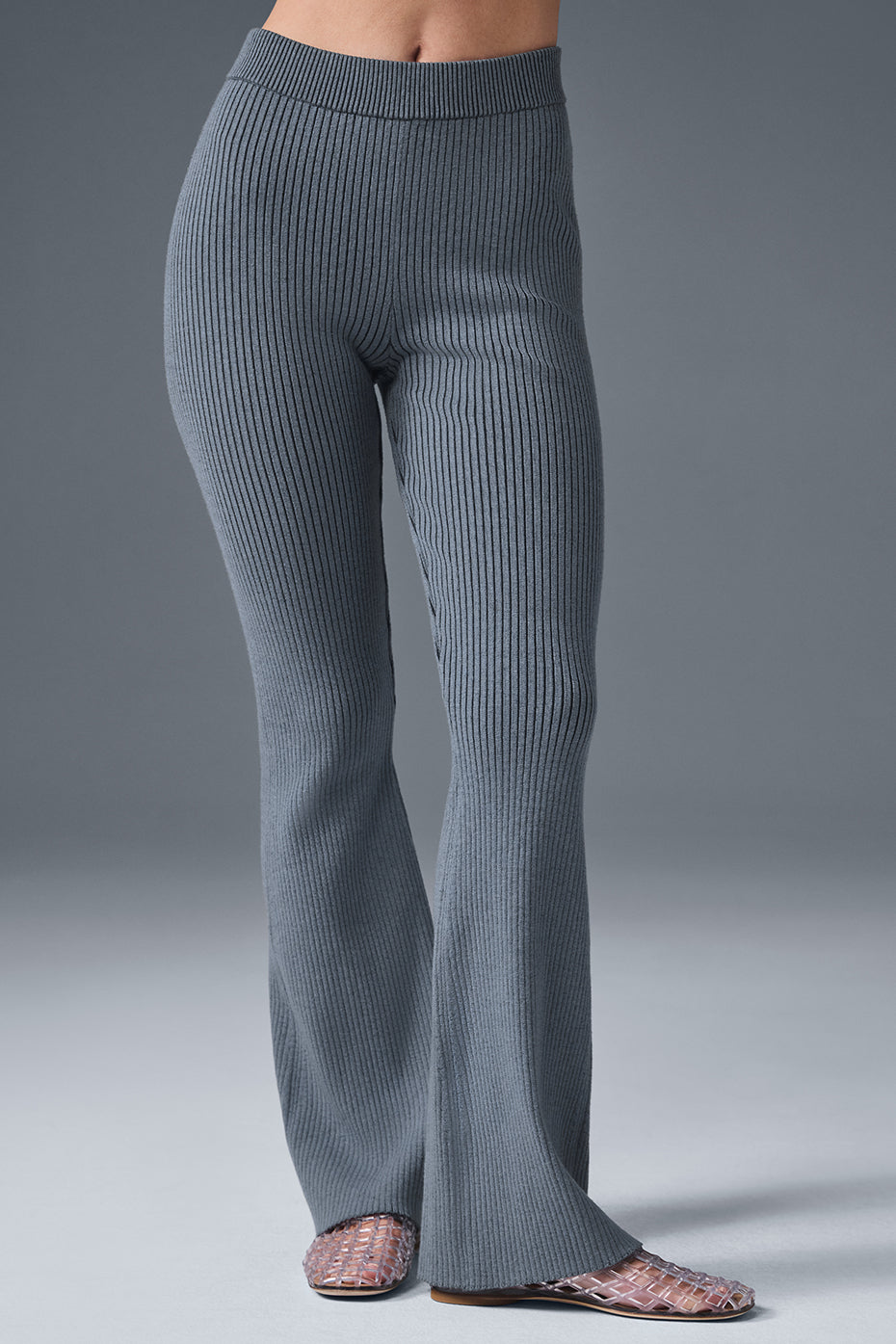 Front view of steel grey flare pants women style with ribbed knit texture