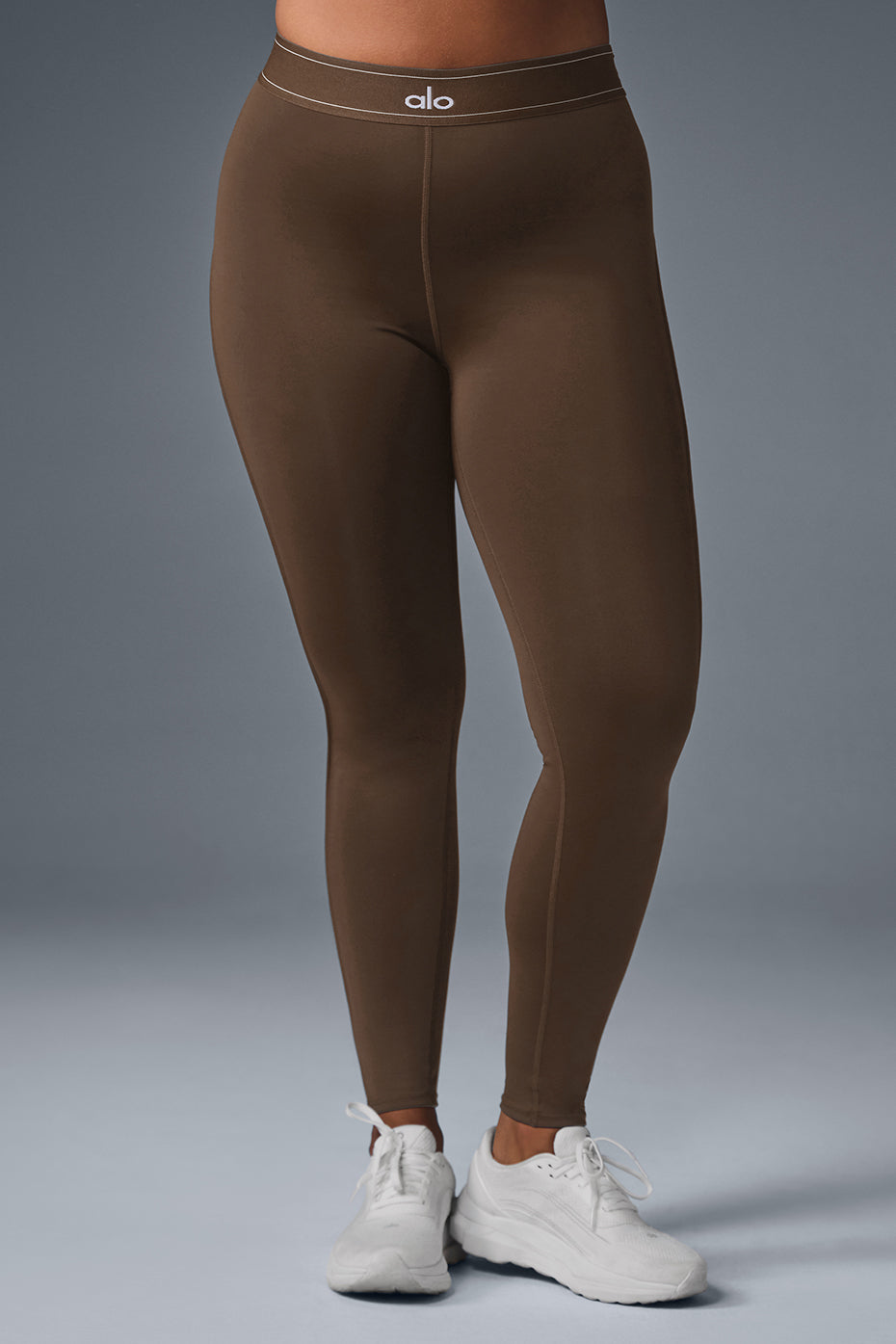 Side view showcasing the boxer-style waistband of the leggings.