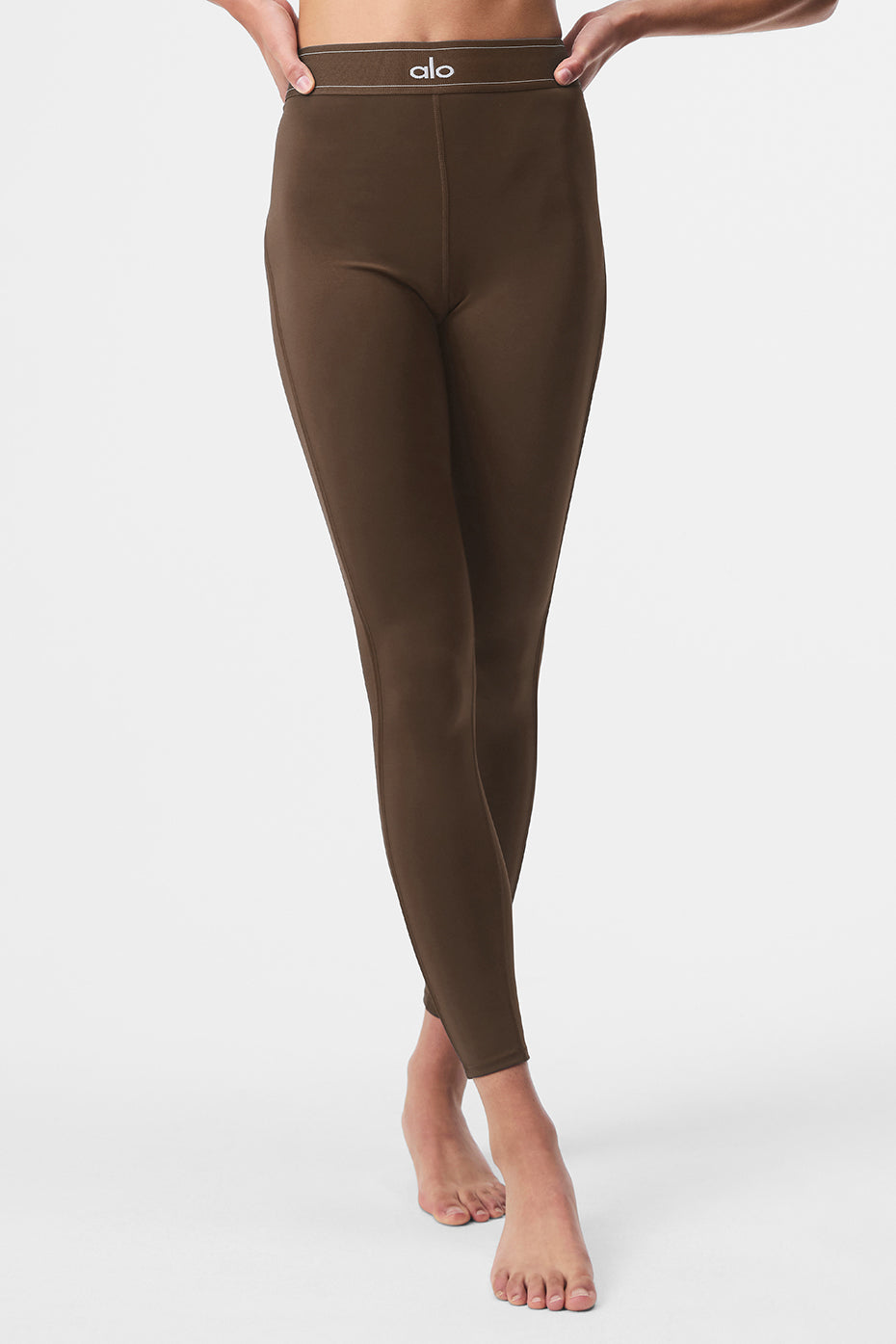 Front view of Airlift high-waist compression leggings in espresso.