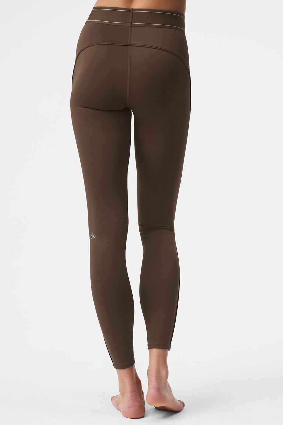 Side view showcasing the boxer-style waistband of the leggings.