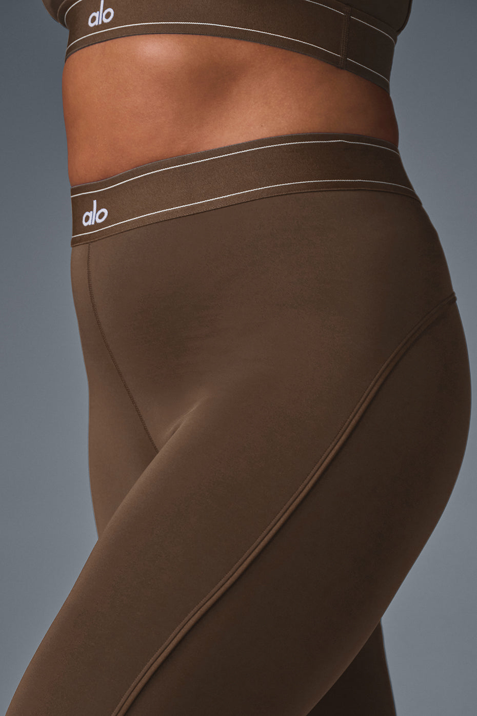 Front view of Airlift high-waist compression leggings in espresso.