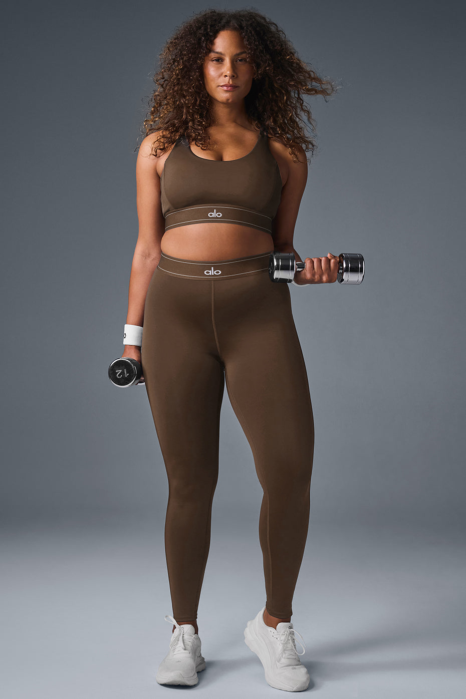 Back view highlighting the body-contouring design of the leggings.