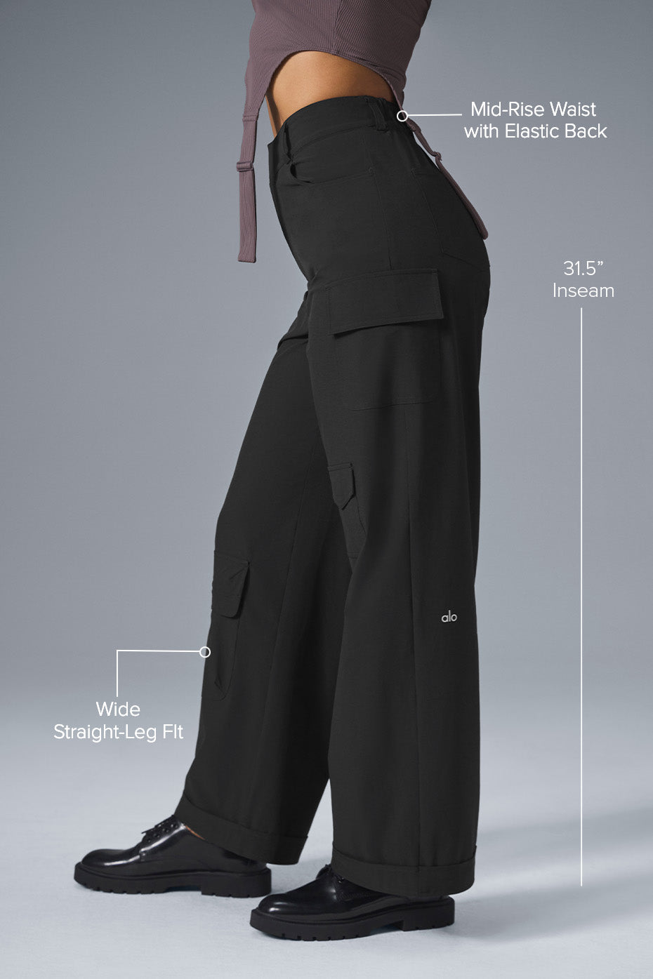 Close-up of the pocket design on black cargo pants for men.