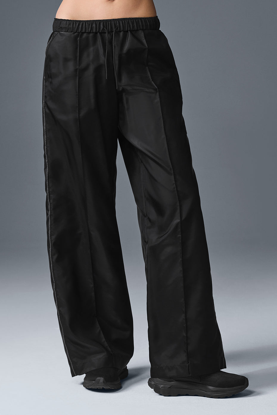 Front view of wide leg linen pants styled casually outdoors