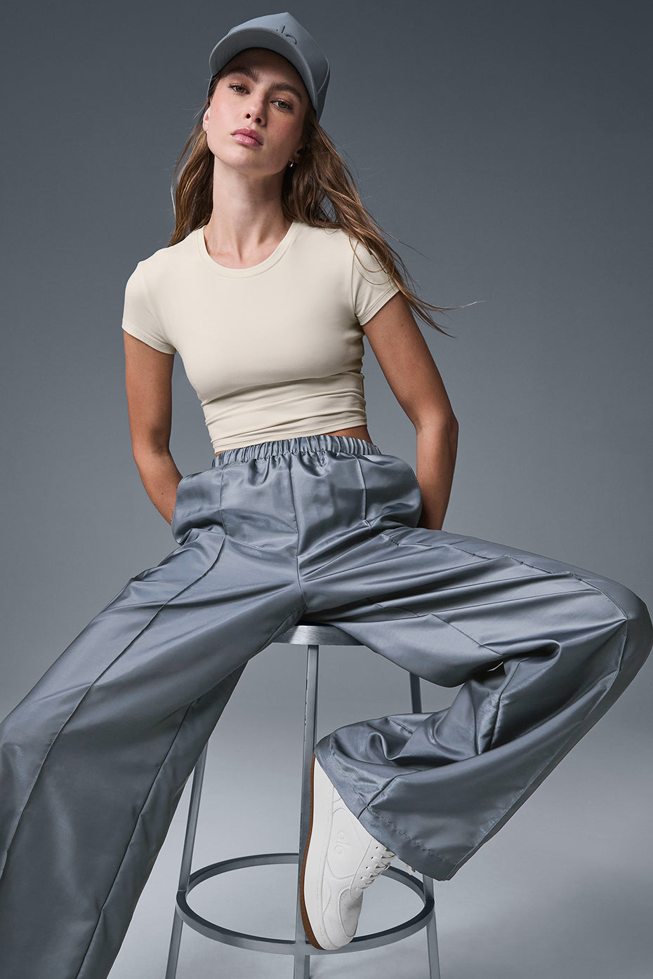 Front view of wide leg track pants women in steel grey with exposed seams