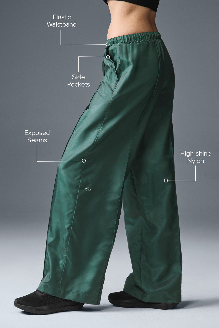 Side view of womens winter pants, highlighting exposed seam detailing.