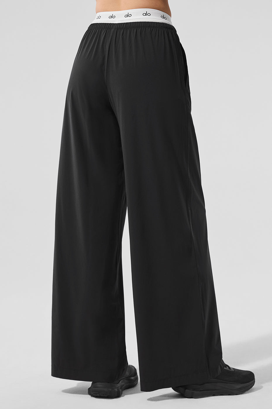 Stylish outfit pairing these black dress pants for women with a blazer