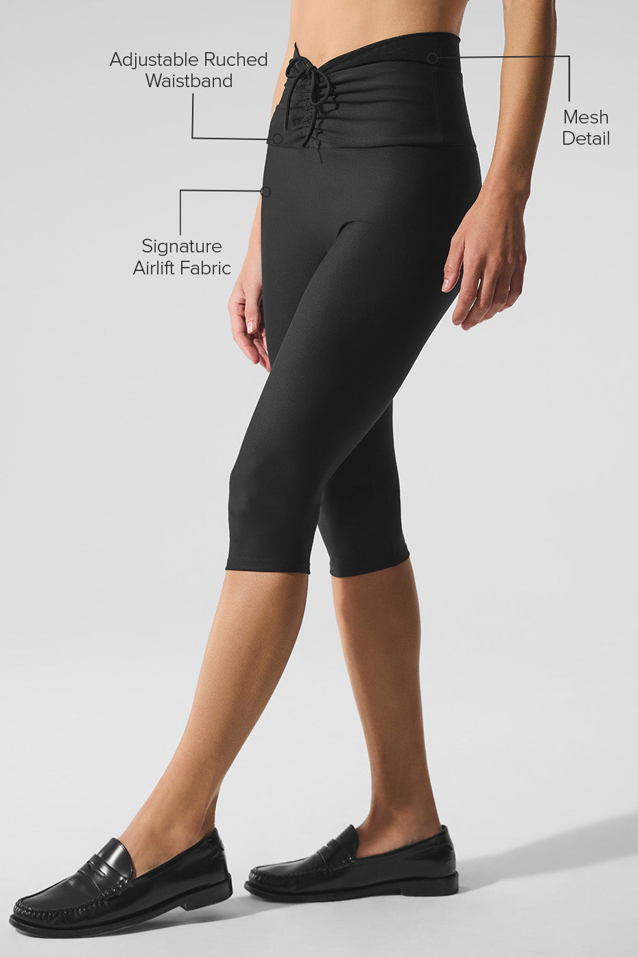 Side view of breathable black mesh leggings suitable for gym or casual outings