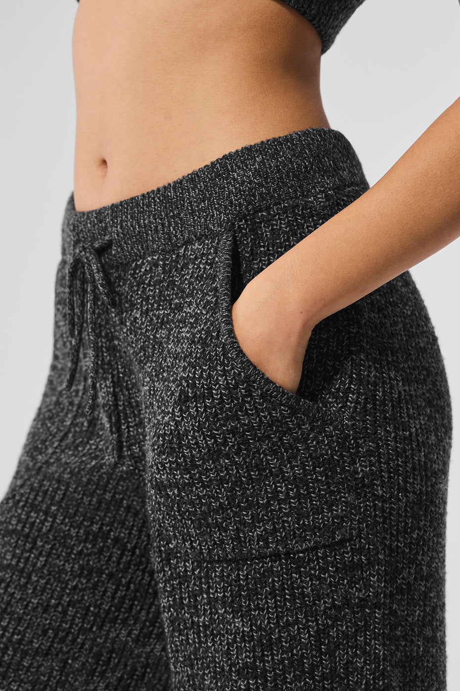 Close-up of drawstring waistband and marl knit texture on sweater pants