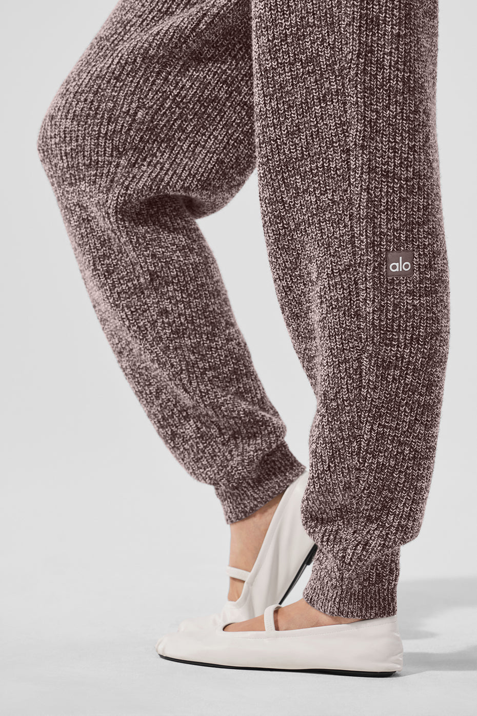 Close-up of marl knit texture on mens joggers, highlighting comfort and softness