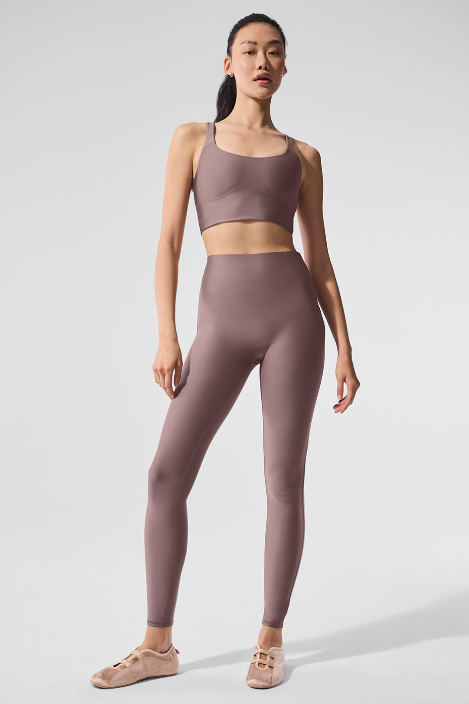 Side view of leggings during yoga stretch, showcasing flexibility
