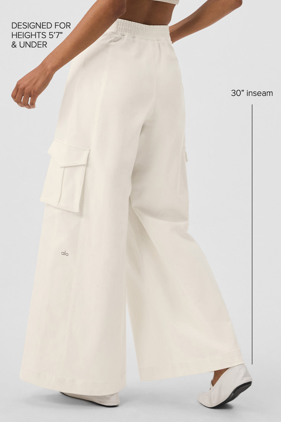 Close-up of high waist trousers with exaggerated wide legs