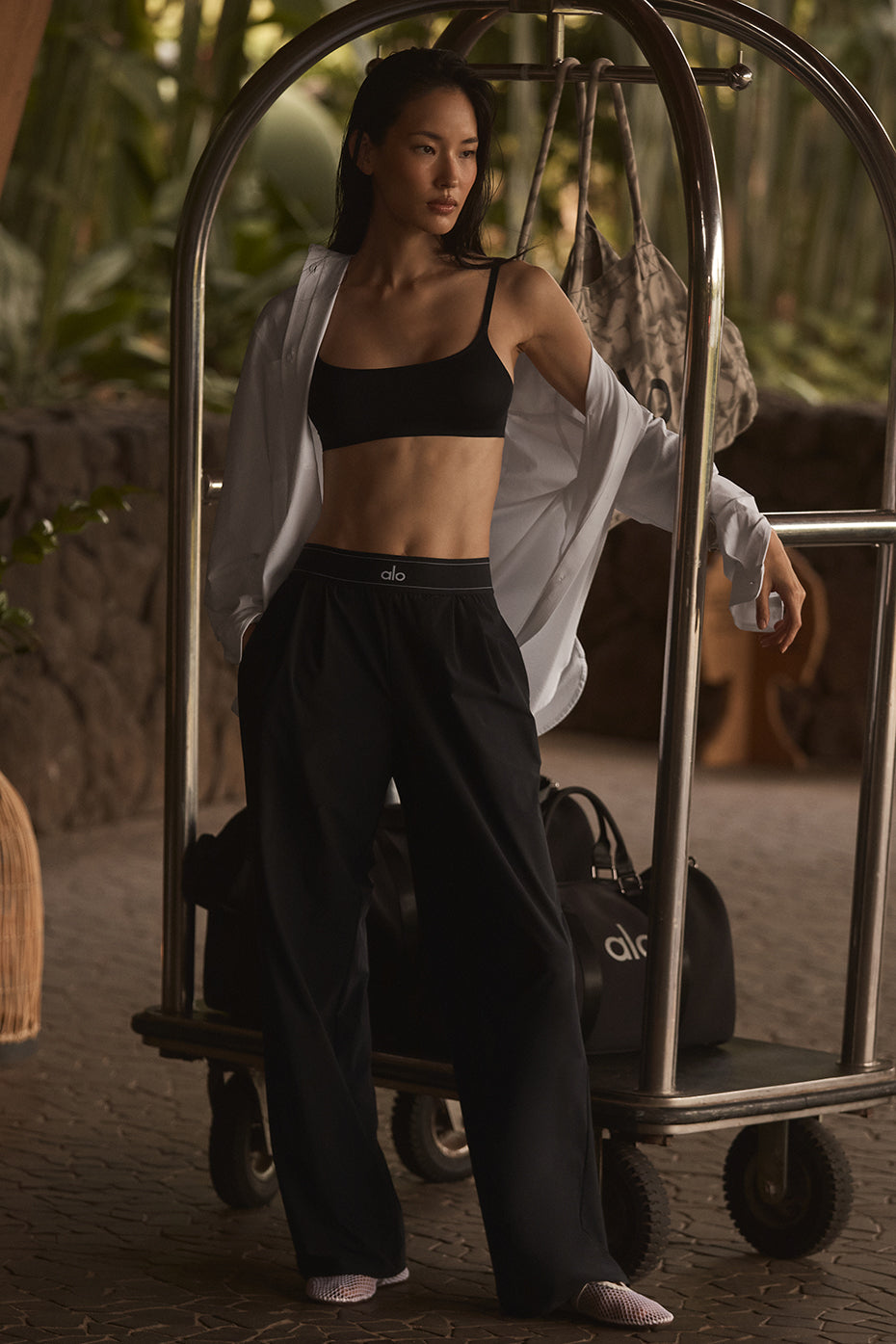 Black straight-leg trousers styled with blazer for office wear