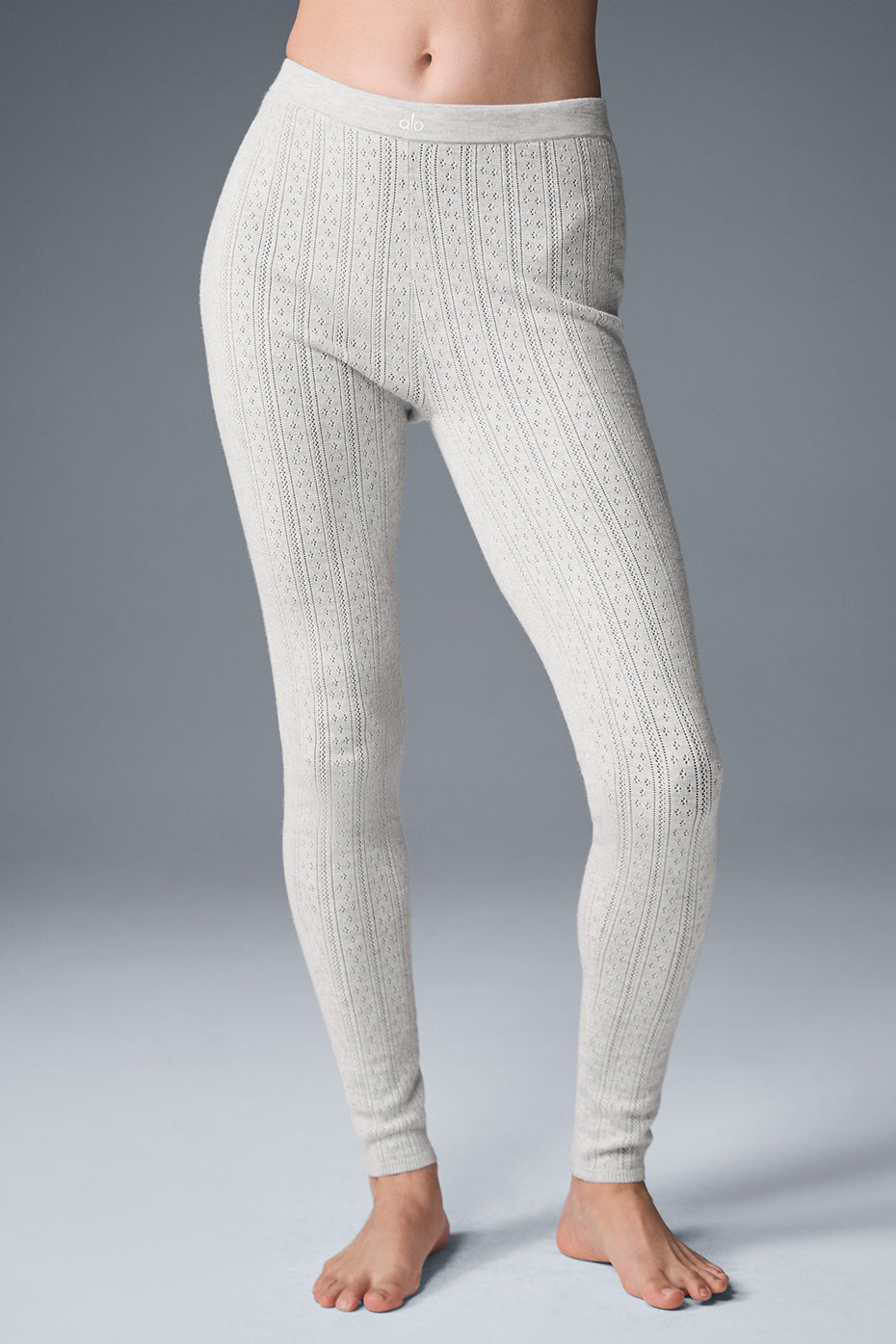 Front view of high-waist leggings, styled with s&s activewear bra for indoor lounging.