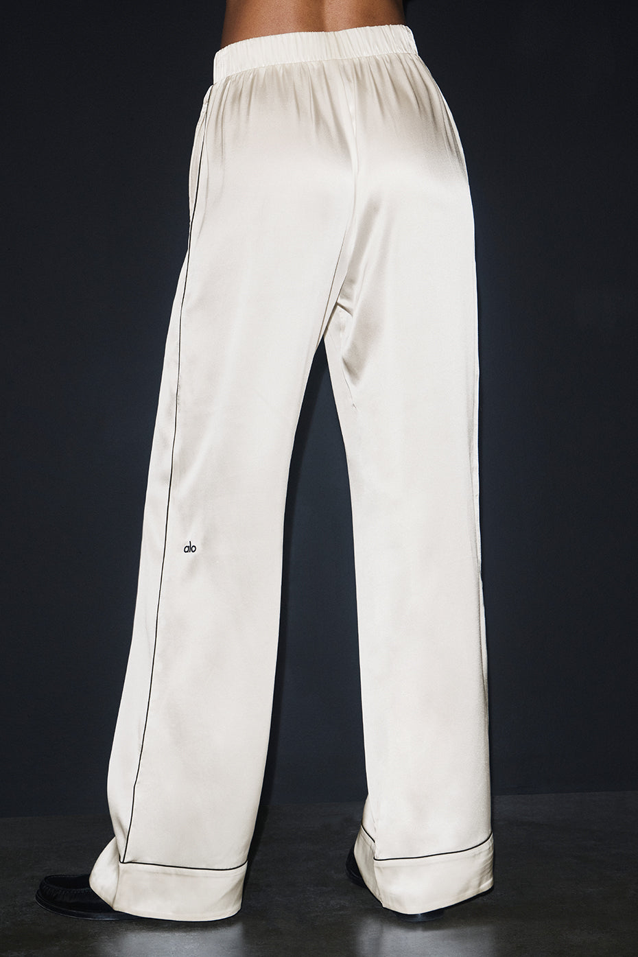 Close-up of the Courchevel silk fabric texture, highlighting its luxurious sheen.