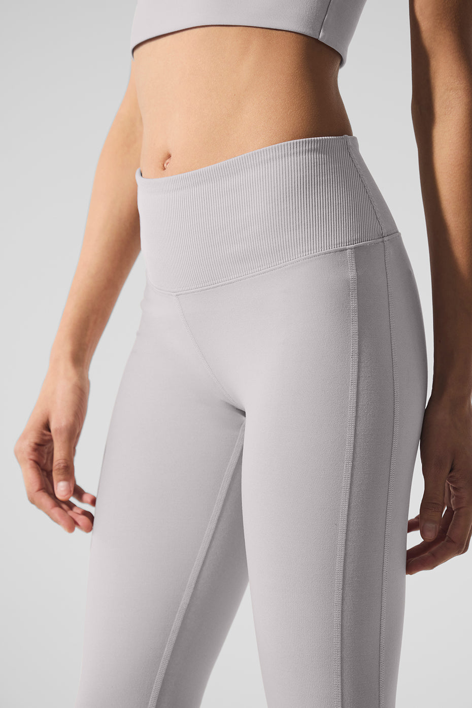 Woman practicing yoga in Alosoft Luxe High-Waist Lounge Leggings, demonstrating flexibility.