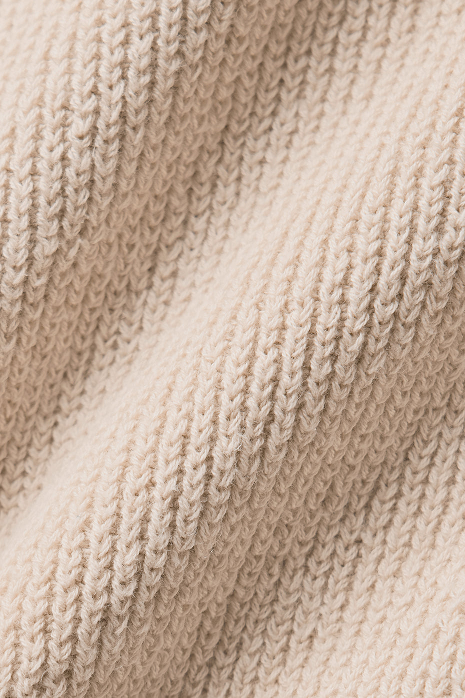 Lightweight knitwear pants on a model walking along a dune trail