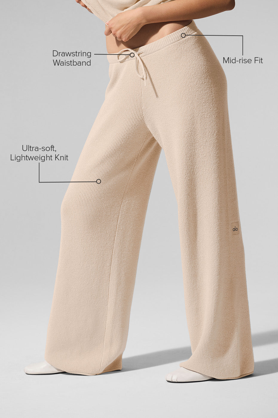 Mid-rise beach loungewear pants styled with sandals and cotton tank