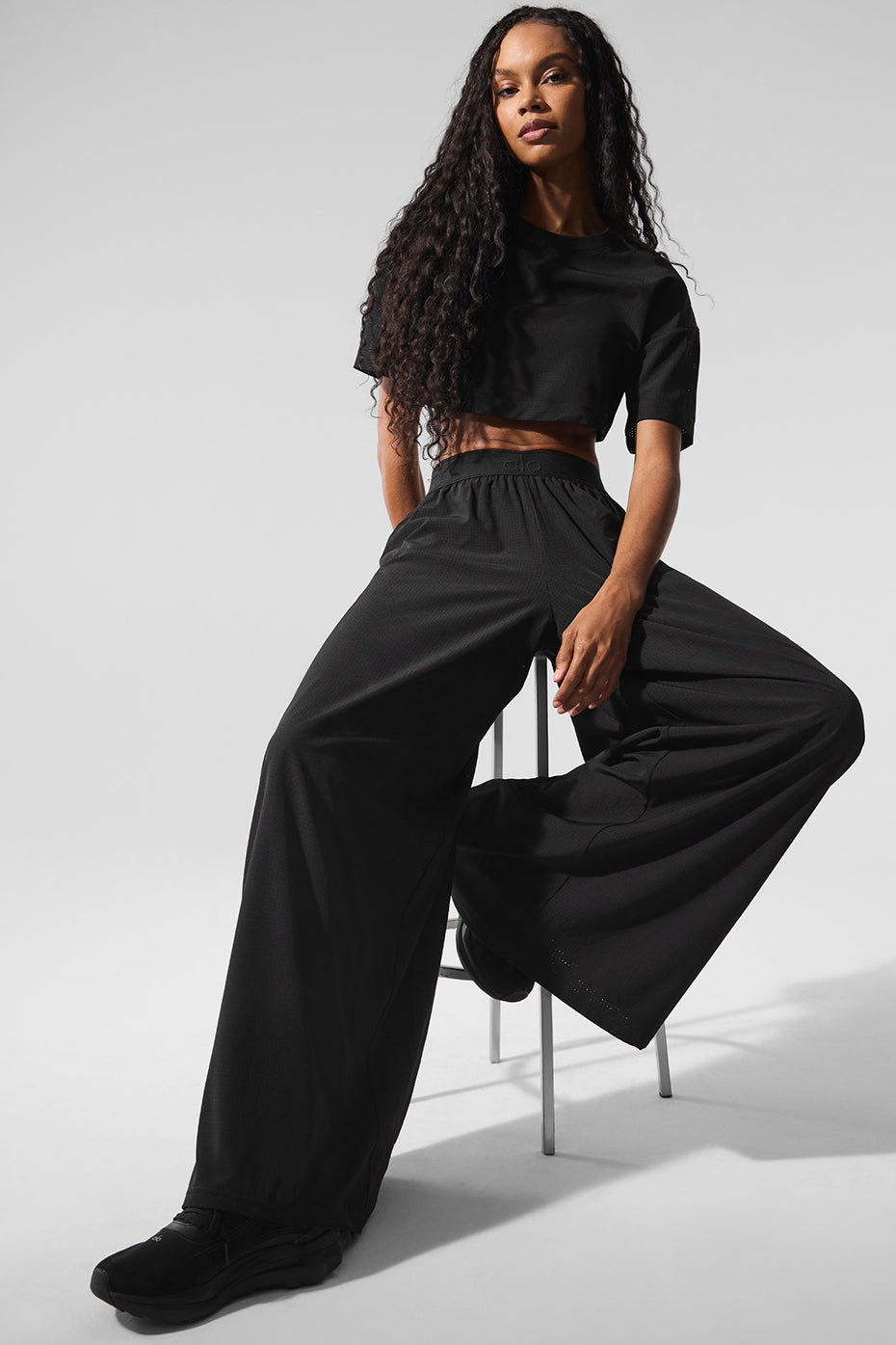 Front angle of lightweight trousers with mesh lining styled against desert backdrop