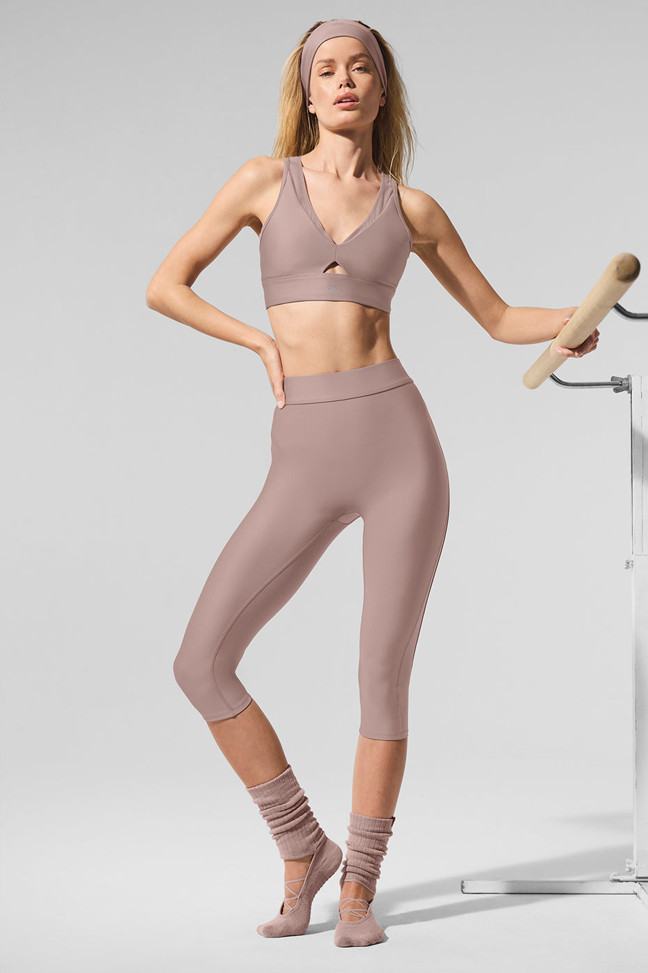 Side view showcasing breathable mesh panels of the high-waist capris.