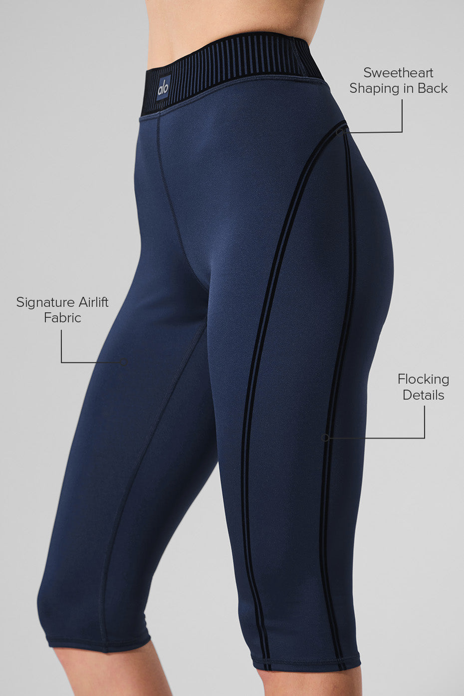 Model wearing high-waist leggings in a yoga pose