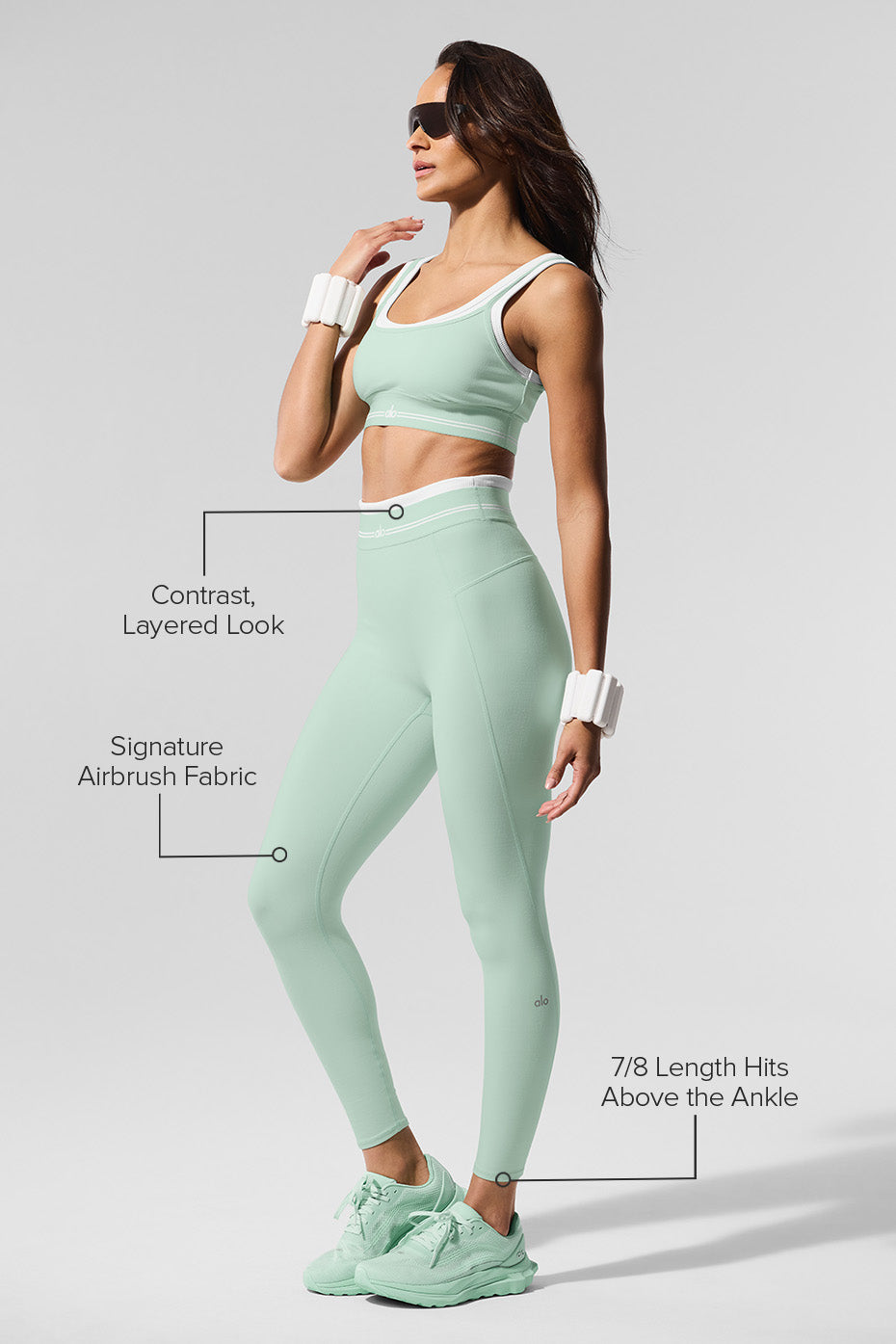 Close-up of the elastic logo waistband on the leggings