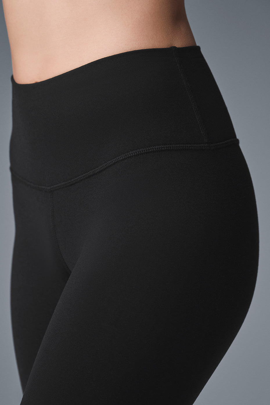 Front view of sculpting high waist capri leggings in black
