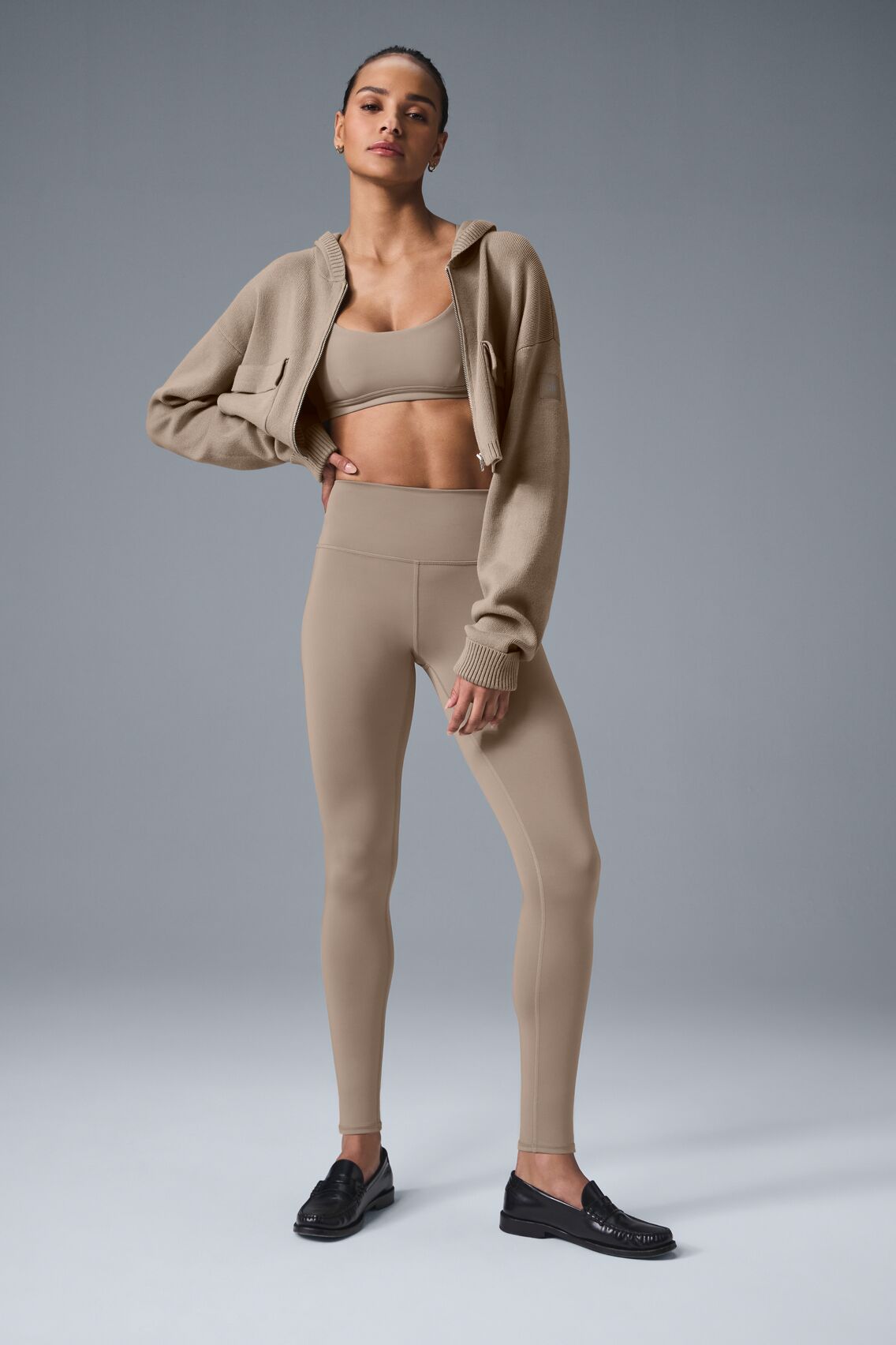 Side view of supportive compression leggings for women during yoga