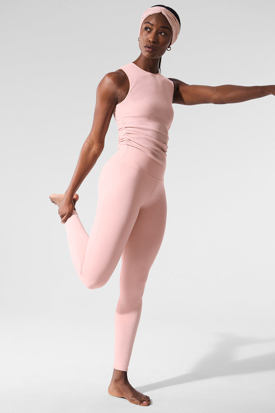 Front view of cropped high-waist leggings in Pink Quartz, ideal for light training