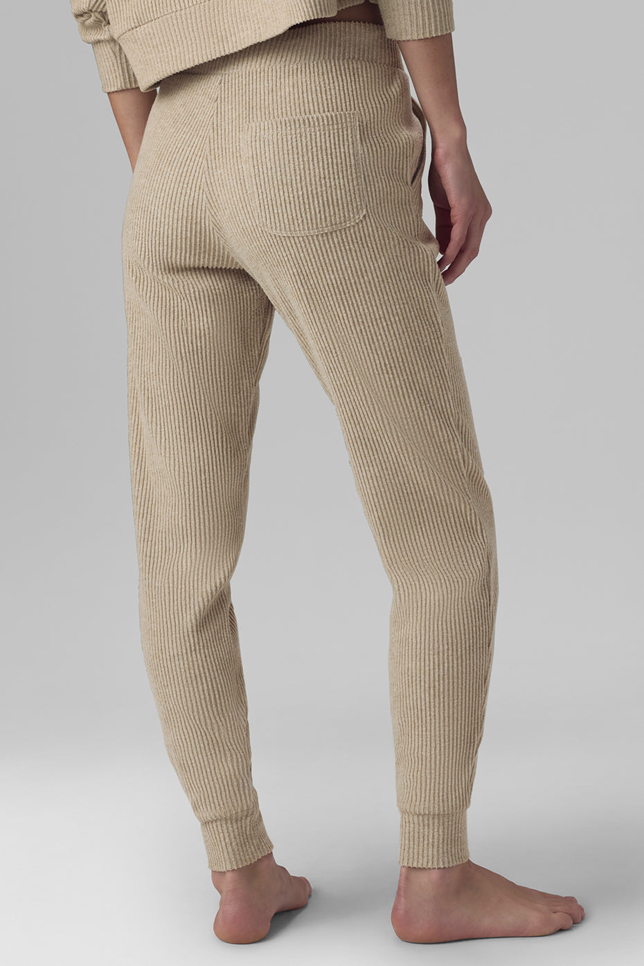 Side angle of baggy sweatpants paired with sneakers for weekend errands