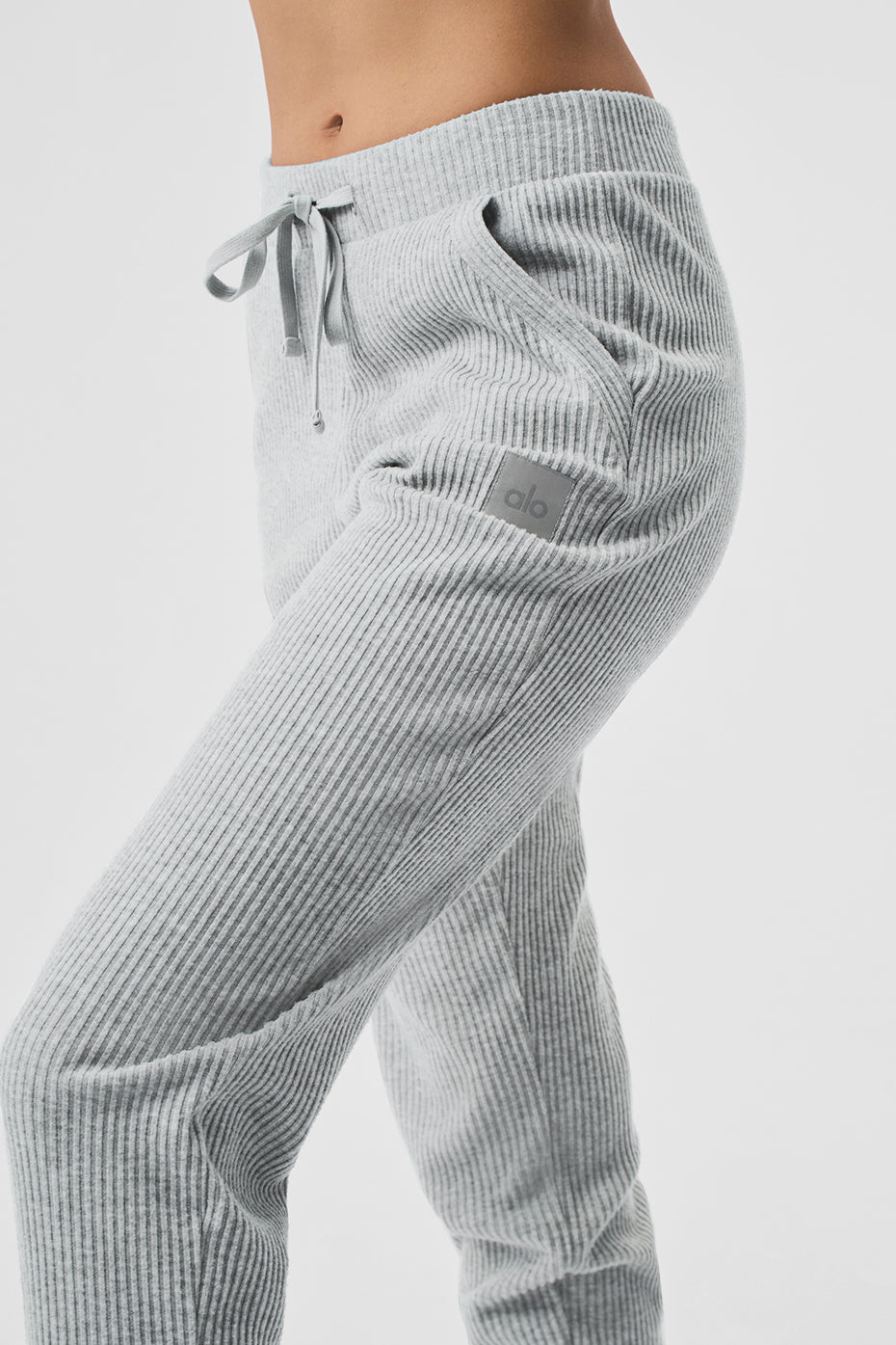 Side view showcasing the jogger-style silhouette of Muse Sweatpants